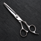 CHITIAN Z-03 silver wet & dry barber shears on black stone background